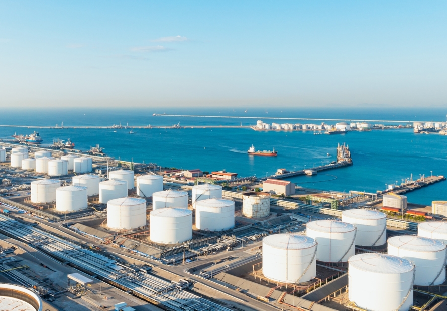 Picture shows several tanks in a port environment